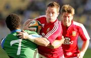 30 May 2009; Shane Williams, British and Irish Lions, in action against Devon Raubenheimer, Royal XV. British and Irish Lions v Royal XV, Royal Bafokeng Sports Palace, Phokeng, Nr Rustenburg, South Africa. Picture credit: Seconds Left / SPORTSFILE