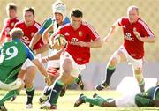 30 May 2009; Jamie Roberts, British and Irish Lions, in action against Sarel Pretorius, Royal XV. British and Irish Lions v Royal XV, Royal Bafokeng Sports Palace, Phokeng, Nr Rustenburg, South Africa. Picture credit: Seconds Left / SPORTSFILE