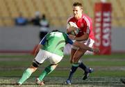 30 May 2009; British and Irish Lions Lee Byrne drives into a tackle by Hanno Coetzee, Royal XV. British and Irish Lions v Royal XV, Royal Bafokeng Sports Palace, Phokeng, Nr Rustenburg, South Africa. Picture credit: Seconds Left / SPORTSFILE