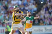 30 May 2009; Stephen Banville, Wexford, scores his side's second goal of the game against Offaly despite the tackle of David Franks. Leinster GAA Hurling Senior Championship First Round, Wexford v Offaly, Wexford Park, Wexford. Picture credit: Matt Browne / SPORTSFILE