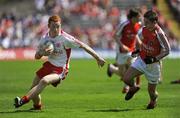 31 May 2009; John McCullagh, Tyrone, in action against Kealan Downey, Armagh. Ulster GAA Football Minor Championship, Tyrone v Armagh, St. Tiernach's Park, Clones, Co.Monaghan. Picture credit: Oliver McVeigh / SPORTSFILE