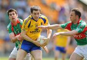 31 May 2009; Ronan Cox, Roscommon, in action against Colm Cafferkey, left, and Dermot Costello, Mayo. Connacht GAA Football Junior Championship Final, Mayo v Roscommon, Pairc Sean Mac Diarmada, Carrick-On-Shannon, Co Leitrim. Picture credit: David Maher / SPORTSFILE