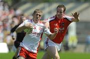 31 May 2009; Kevin Hughes, Tyrone, in action against James Lavery, Armagh. Ulster GAA Football Senior Championship Quarter-Final, Tyrone v Armagh, St. Tiernach's Park, Clones, Co.Monaghan. Picture credit: Oliver McVeigh / SPORTSFILE