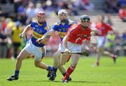 31 May 2009; Brendan Ring, Cork, in action against Lee Mackey, left, and Christy Coghlan, Tipperary. Munster GAA Hurling Intermediate Championship Quarter-Final, Tipperary v Cork, Semple Stadium, Thurles, Co. Tipperary. Picture credit: Brendan Moran / SPORTSFILE