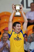 31 May 2009; Martin Reynolds, Roscommon captain lifts the cup at the end of the game. Connacht GAA Football Junior Championship Final, Mayo v Roscommon, Pairc Sean Mac Diarmada, Carrick-On-Shannon, Co Leitrim. Picture credit: David Maher / SPORTSFILE