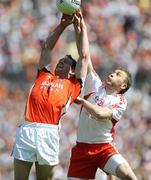 31 May 2009; Finnian Moriarty, Armagh, in action against Sean O'Neill, Tyrone . Ulster GAA Football Senior Championship Quarter-Final, Tyrone v Armagh, St. Tiernach's Park, Clones, Co.Monaghan. Picture credit: Oliver McVeigh / SPORTSFILE