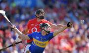 31 May 2009; Aisake O hAilpin, Cork, and Paul Curran, Tipperary, contest a dropping ball. Munster GAA Hurling Senior Championship Quarter-Final, Tipperary v Cork, Semple Stadium, Thurles, Co. Tipperary. Picture credit: Brendan Moran / SPORTSFILE