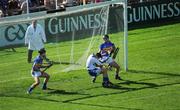 31 May 2009; Tipperary goalkeeper Brendan Cummins, supported by Conor O'Mahony and Paul Curran, deflects a penalty out for a '65'. Munster GAA Hurling Senior Championship Quarter-Final, Tipperary v Cork, Semple Stadium, Thurles, Co. Tipperary. Picture credit: Ray McManus / SPORTSFILE