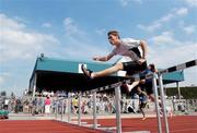 30 May 2009; Edmond O'Halloran, Rochestown College, Cork, on his way to finishing 2nd in the Senior Boys 110m Hurdles. Irish Schools Track and Field Championships, Tullamore Harriers, Tullamore, Co. Offaly. Photo by Sportsfile