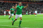11 October 2015; Jonathan Walters, Republic of Ireland, celebrates after scoring his side's opening goal from the penalty spot. UEFA EURO 2016 Championship Qualifier, Group D, Poland v Republic of Ireland. Stadion Narodowy, Warsaw, Poland. Picture credit: Seb Daly / SPORTSFILE