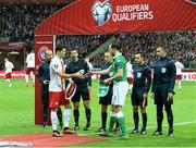 11 October 2015;  Republic of Ireland captain John O'Shea shakes hands with Poland captain Robert Lewandowski before the start of the game. UEFA EURO 2016 Championship Qualifier, Group D, Poland v Republic of Ireland. Stadion Narodowy, Warsaw, Poland. Picture credit: David Maher / SPORTSFILE