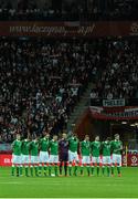 11 October 2015; The Republic of Ireland palyers stand for a moment of silence for the recent tragedy in Carrickmines before the game. UEFA EURO 2016 Championship Qualifier, Group D, Poland v Republic of Ireland. Stadion Narodowy, Warsaw, Poland Picture credit: David Maher / SPORTSFILE