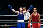 12 October 2015; Joseph Ward, Ireland, exchanges punches with Elshod Rasulov, Uzbekistan, during their Men's Light Heavyweight 81kg Semi-Final Bout. AIBA World Boxing Championships, Semi-Finals. Ali Bin Hamad Al Attiyah Arena, Doha, Qatar. Photo by Sportsfile