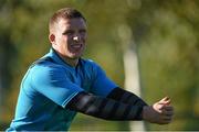 13 October 2015; Munster's Andrew Conway stretches before squad training. Munster Rugby Squad Training and Press Conference, CIT, Bishoptown, Cork. Picture credit: Diarmuid Greene / SPORTSFILE