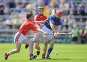 31 May 2009; Mark O'Meara, Tipperary, in action against John Carey, left, and Rory Dwyer, Cork. Munster GAA Hurling Intermediate Championship Quarter-Final, Tipperary v Cork, Semple Stadium, Thurles, Co. Tipperary. Picture credit: Brendan Moran / SPORTSFILE