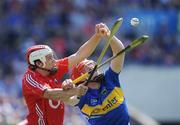 31 May 2009; Dara McSweeney, Cork, contests a high ball with Cathal Dillon, Tipperary. Munster GAA Hurling Intermediate Championship Quarter-Final, Tipperary v Cork, Semple Stadium, Thurles, Co. Tipperary. Picture credit: Brendan Moran / SPORTSFILE