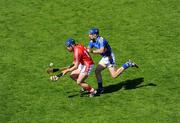 31 May 2009; Pat Horgan, Cork, in action against Paddy Stapleton, Tipperary. Munster GAA Hurling Senior Championship Quarter-Final, Tipperary v Cork, Semple Stadium, Thurles, Co. Tipperary. Picture credit: Ray McManus / SPORTSFILE
