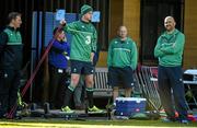 14 October 2015; Ireland's Jonathan Sexton goes through some drills supervised by team physio James Allen, left, and team doctor Dr. Eanna Falvey, right, during squad training. Ireland Rugby Squad Training, Sophie Gardens, Cardiff, Wales. Picture credit: Brendan Moran / SPORTSFILE