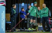 14 October 2015; Ireland's Jonathan Sexton goes through some drills supervised by team physio James Allen, left, and team doctor Dr. Eanna Falvey, right, during squad training. Ireland Rugby Squad Training, Sophie Gardens, Cardiff, Wales. Picture credit: Brendan Moran / SPORTSFILE