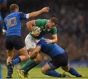 11 October 2015; Robbie Henshaw, Ireland, is tackled by Frederic Michalak, left, and Guilhem Guirado, France. 2015 Rugby World Cup Pool D, Ireland v France. Millennium Stadium, Cardiff, Wales. Picture credit: Stephen McCarthy / SPORTSFILE