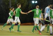 14 October 2015; Lee Cole, Ireland, celebrates with team-mate Eugene Magee after scoring his side's goal. Argentina goal keeper Tomas Santiago. Men's Hockey International, Ireland v Argentina, National Hockey Stadium, UCD, Belfield, Dublin. Picture credit: Cody Glenn / SPORTSFILE