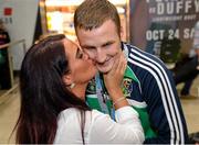 16 October 2015; Michael O'Reilly, Middleweight Bronze Medalist, receives a kiss from his wife, Chantelle O'Reilly, at Team Ireland's return from the AIBA World Boxing Championships, in Doha, Qatar. Team Ireland return from the AIBA World Boxing Championships. Dublin Airport, Dublin. Picture credit: Sam Barnes / SPORTSFILE
