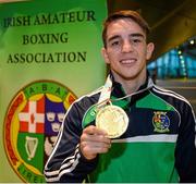 16 October 2015; Michael Conlan, Bantam Weight Gold Medalist, poses with his gold medal at Team Ireland's return from the AIBA World Boxing Championships, in Doha, Qatar. Team Ireland return from the AIBA World Boxing Championships. Dublin Airport, Dublin. Picture credit: Sam Barnes / SPORTSFILE