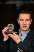 16 October 2015; Tipperary's Brendan Cummins and Armagh's Oisín McConville were tonight inducted into the Hall of Fame at the 2015 Gaelic Writers’ Association Awards at the Jackson Court Hotel in Dublin. Pictured is Oisín McConville with his award. Gaelic Writers Association Awards 2015. Jackson Court Hotel, Harcourt Street, Dublin. Picture credit: Piaras Ó Mídheach / SPORTSFILE