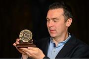 16 October 2015; Tipperary's Brendan Cummins and Armagh's Oisín McConville were tonight inducted into the Hall of Fame at the 2015 Gaelic Writers’ Association Awards at the Jackson Court Hotel in Dublin. Pictured is Oisín McConville with his award. Gaelic Writers Association Awards 2015. Jackson Court Hotel, Harcourt Street, Dublin. Picture credit: Piaras Ó Mídheach / SPORTSFILE