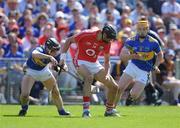 31 May 2009; Aisake O hAilpin, Cork, in action against Paul Curran, left, and Padraic Maher, Tipperary. Munster GAA Hurling Senior Championship Quarter-Final, Tipperary v Cork, Semple Stadium, Thurles, Co. Tipperary. Picture credit: Brendan Moran / SPORTSFILE