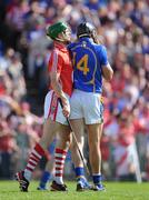 31 May 2009; Eoin Cadogan, Cork, and Micheal Webster, Tipperary. Munster GAA Hurling Senior Championship Quarter-Final, Tipperary v Cork, Semple Stadium, Thurles, Co. Tipperary. Picture credit: Brendan Moran / SPORTSFILE