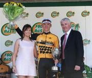 24 May 2009; Overall best U23 rider Mark McNally, Halfords Bike Hut, with Miss FBD Insurance Ras Eimear Kavanagh and Adrian Taheny, Director of Marketing and Sales, FBD Insurance. FBD Insurance Ras, Stage 8, Clara to Skerries. Picture credit: Stephen McCarthy / SPORTSFILE