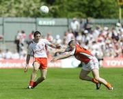 31 May 2009; PJ Quinn, Tyrone, in action against Kevin O'Rourke, Armagh. Ulster GAA Football Senior Championship Quarter-Final, Tyrone v Armagh, St. Tiernach's Park, Clones, Co.Monaghan. Picture credit: Oliver McVeigh / SPORTSFILE