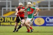 6 June 2009; Eoghan Madigan, Mayo, in action against Sean Ennis, Down. Christy Ring Cup Semi-Final, Down v Mayo, Pairc Esler, Newry, Co. Down. Photo by Sportsfile