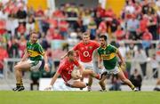 7 June 2009; Pearse O'Neill, 11, and Ger Spillane, Cork, in action against Tommy Griffin, left, and Paul Galvin, Kerry. Munster GAA Football Senior Championship Semi-Final, Kerry v Cork, Fitzgerald Stadium, Killarney, Co. Kerry. Picture credit: Stephen McCarthy / SPORTSFILE