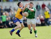 7 June 2009; Ger Collins, Limerick, is tackled by Martin McMahon, Clare. Munster GAA Football Senior Championship Semi-Final, Clare v Limerick, Cusack Park, Ennis, Co. Clare. Picture credit: Matt Browne / SPORTSFILE
