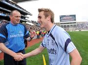7 June 2009; Paul Griffin, Dublin captain, shakes hands with Dublin manager Pat Gilroy at the end of the game. Leinster GAA Football Senior Championship Quarter-Final, Dublin v Meath, Croke Park, Dublin. Picture credit: David Maher / SPORTSFILE