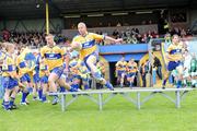 7 June 2009; Clare's David Russell, 11, and Enda Coughlan, 10, make their way onto the pitch for the game against Limerick. Munster GAA Football Senior Championship Semi-Final, Clare v Limerick, Cusack Park, Ennis, Co. Clare. Picture credit: Matt Browne / SPORTSFILE