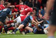 17 October 2015; Jordan Coghlan, Munster, scores his side's fourth try despite the efforts of Tavis Knoyle, Cardiff Blues. Guinness PRO12, Round 4, Munster v Cardiff Blues. Irish Independent Park, Cork. Picture credit: Diarmuid Greene / SPORTSFILE