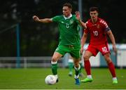 9 October 2015; Alan Browne, Republic of Ireland, gets past the challenge of Simonas Stankevicius, Lithuania. UEFA Euro 2017 U21 Championship Qualifier, Group 2, Republic of Ireland v Lithuania. RSC, Waterford. Picture credit: Piaras Ó Mídheach / SPORTSFILE