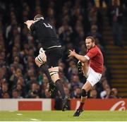 17 October 2015; Brodie Retallick, New Zealand, blocks down the kick of Frederic Michalak, France, before going onto score his side's first try. 2015 Rugby World Cup, Quarter-Final, New Zealand v France. Millennium Stadium, Cardiff, Wales. Picture credit: Stephen McCarthy / SPORTSFILE