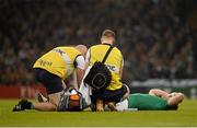 18 October 2015; Tommy Bowe, Ireland, is attended to by Ireland team doctor Dr Eanna Falvey, left, and Ireland physiotherapist James Allen before leaving the field with an injury. 2015 Rugby World Cup Quarter-Final, Ireland v Argentina. Millennium Stadium, Cardiff, Wales.  Picture credit: Brendan Moran / SPORTSFILE