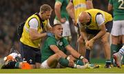 18 October 2015; Ian Madigan, Ireland, is attended to by Ireland team doctor Dr Eanna Falvey, right, and Ireland physiotherapist James Allen. 2015 Rugby World Cup Quarter-Final, Ireland v Argentina. Millennium Stadium, Cardiff, Wales. Picture credit: Matt Browne / SPORTSFILE