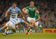 18 October 2015; Luke Fitzgerald, Ireland, goes past the tackle of Santiago Cordero, Argentina. 2015 Rugby World Cup Quarter-Final, Ireland v Argentina. Millennium Stadium, Cardiff, Wales. Picture credit: Matt Browne / SPORTSFILE