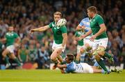 18 October 2015; Luke Fitzgerald, Ireland, is tackled by Santiago Cordero, Argentina, while offloading to Jordi Murphy, right, during the build-up to Ireland's second try. 2015 Rugby World Cup Quarter-Final, Ireland v Argentina. Millennium Stadium, Cardiff, Wales. Picture credit: Brendan Moran / SPORTSFILE