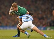 18 October 2015; Chris Henry, Ireland, is tackled by Martin Landajo, Argentina. 2015 Rugby World Cup Quarter-Final, Ireland v Argentina. Millennium Stadium, Cardiff, Wales. Picture credit: Stephen McCarthy / SPORTSFILE