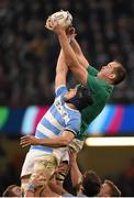 18 October 2015; Devin Toner, Ireland, takes possession in a lineout ahead of Guido Petti, Argentina. 2015 Rugby World Cup Quarter-Final, Ireland v Argentina. Millennium Stadium, Cardiff, Wales. Picture credit: Stephen McCarthy / SPORTSFILE