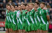 18 October 2015; Sarsfields players stand for the National Anthem before the game. Kildare County Senior Football Championship Final, Athy v Sarsfields. St Conleth's Park, Newbridge, Co. Kildare. Picture credit: Piaras Ó Mídheach / SPORTSFILE