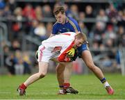 18 October 2015; Adam McManus, Pádraig Pearses, in action against Ultan Harney, Clann na nGael. Roscommon County Senior Football Championship Final, Pádraig Pearses v Clann na nGael. Dr. Hyde Park, Roscommon. Picture credit: David Maher / SPORTSFILE