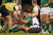 18 October 2015; Conor Murray, Ireland, is attended to by team doctor Dr. Eanna Falvey during the game. 2015 Rugby World Cup Quarter-Final, Ireland v Argentina. Millennium Stadium, Cardiff, Wales. Picture credit: Brendan Moran / SPORTSFILE